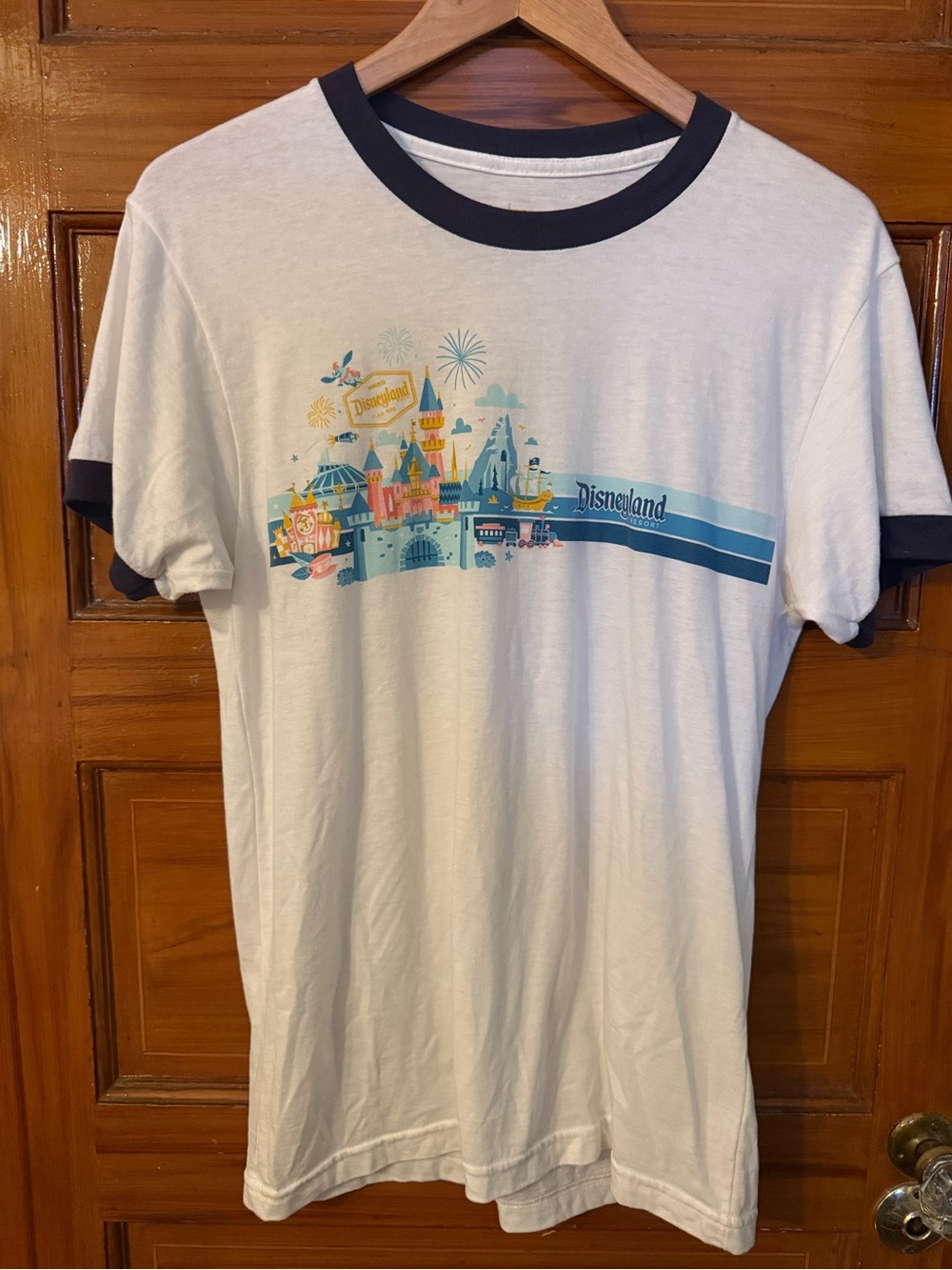 Disney White Ringer Tee with Navy Trim and Colorful Park Graphic